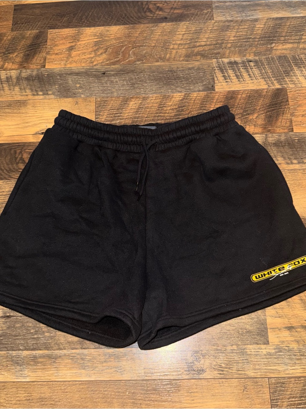 White Fox Boutique Black Athletic Logo Shorts with Yellow Accent